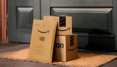 Stacks of flattened Amazon cardboard boxes. 